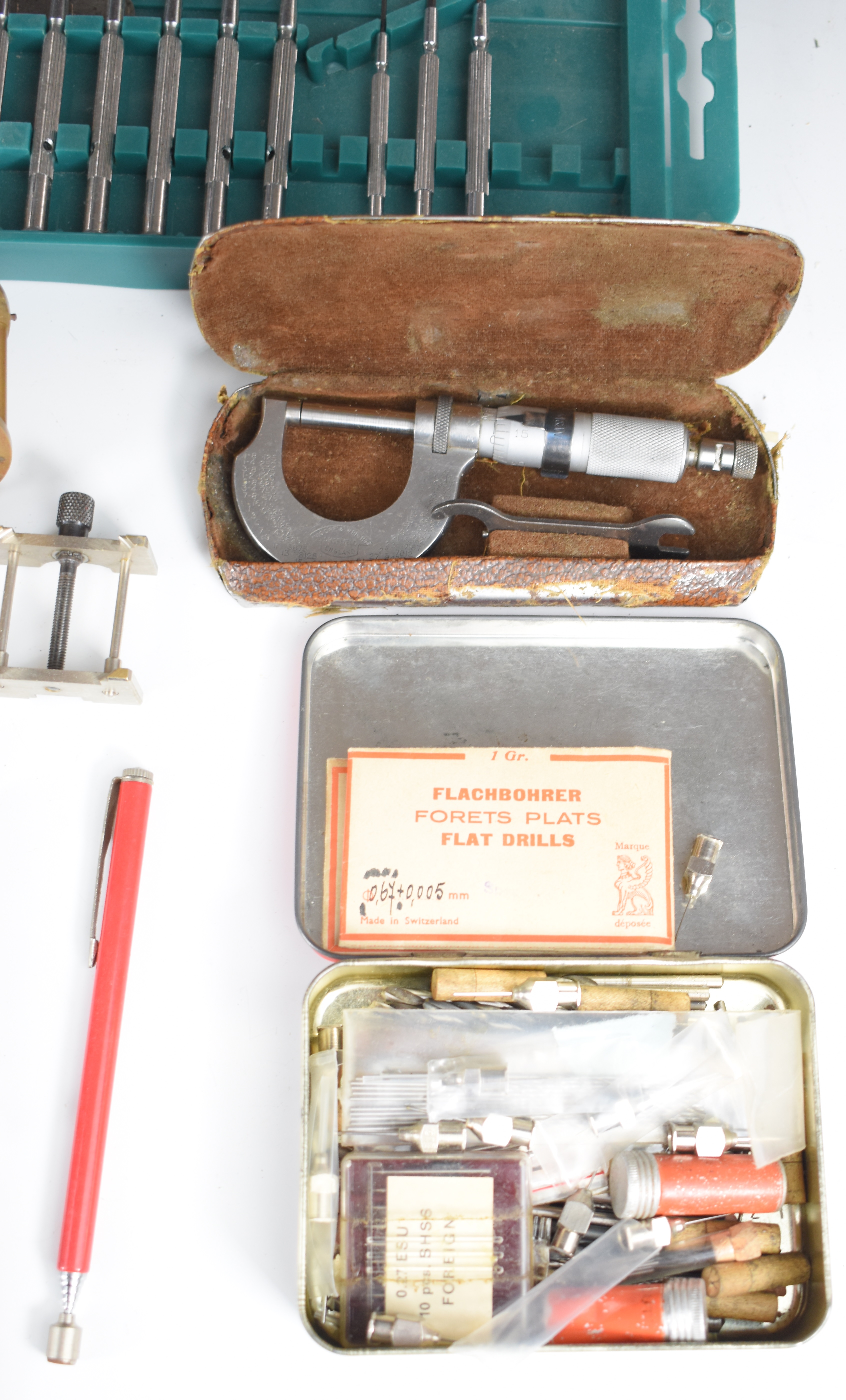 Collection of clock parts, keys, tools, needle files, engraver's wax, clamps etc, in three trays - Image 18 of 21