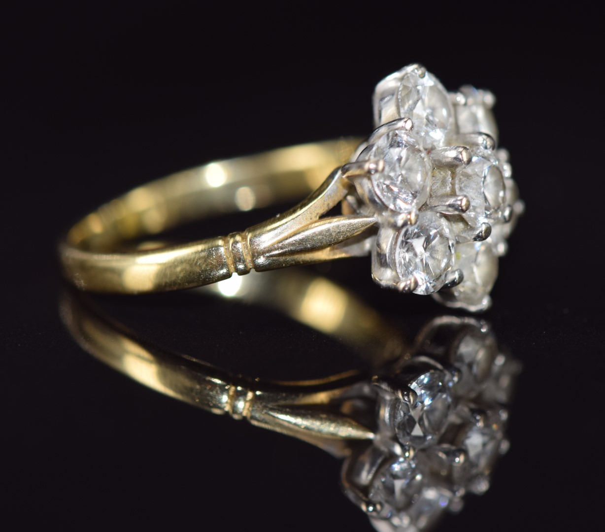 An 18ct gold ring set with seven diamonds, each approximately 0.3ct in a cluster, 4.6g, size O - Image 2 of 2