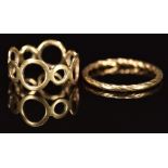 Two 9ct gold rings, one with pierced circular decoration, 3.2g, size K & P