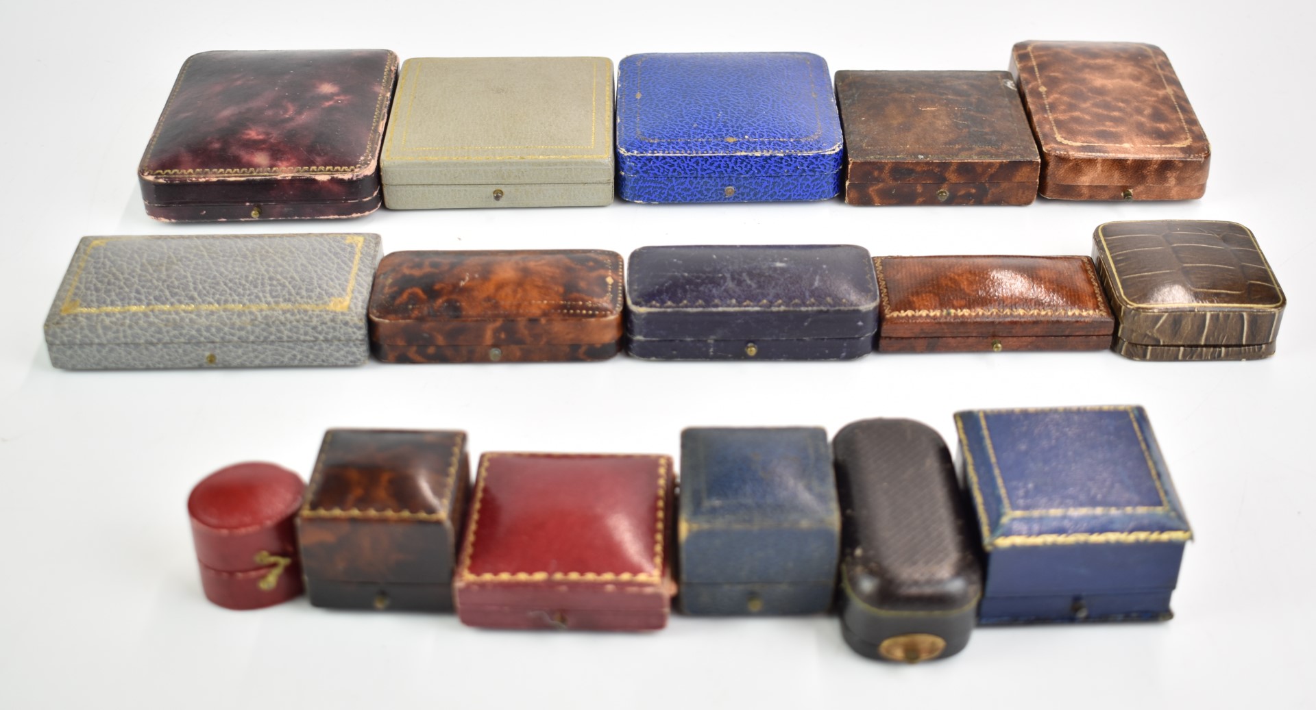 Sixteen vintage jewellery boxes including 'James Wills, Oban', 'Parsons, Bristol', 'Biggs,