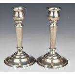 Pair of sterling silver candlesticks, height 15cm