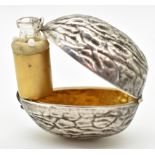 Novelty silver scent bottle holder formed as a walnut, hinging open to reveal a hinge out bottle