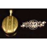 Victorian gilt locket and an Edwardian silver brooch