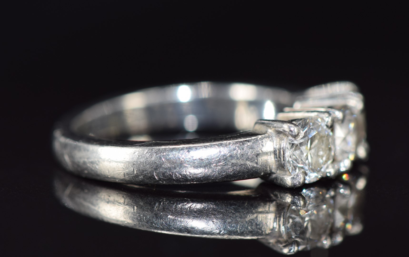 A platinum ring set with three round cut diamonds, each approximately 0.35ct, 6.8g, size J - Image 2 of 2