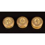 Three Victorian studs with engraved foliate decoration, 2.4g, in Victorian fitted box for Packer,