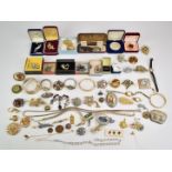 Collection of costume jewellery including silver medal, lucite brooch, 9ct gold iron charm (0.7g),