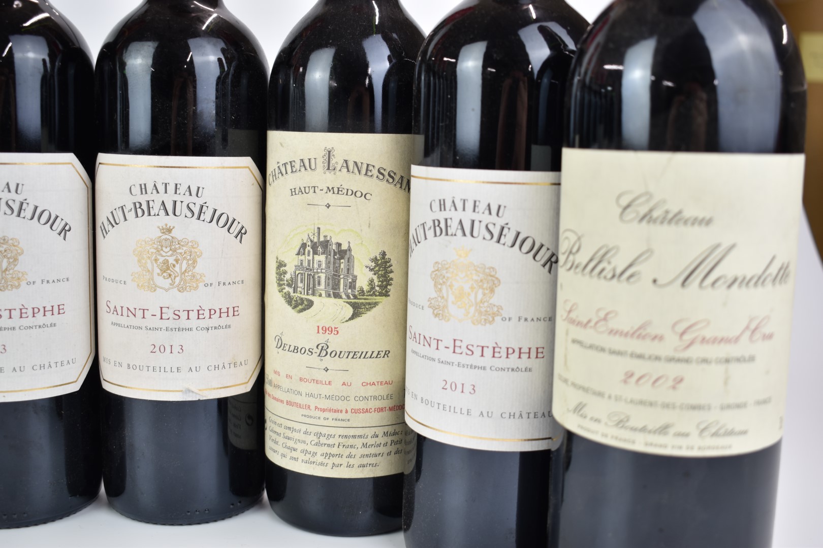 Nine bottles of red wine comprising four Chateau Haut Beauséjour Saint - Estèphe 2013, Chateau Les - Image 4 of 5