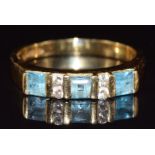 An 18ct gold ring set with topaz and paste, 3.5g, size P