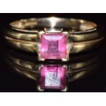 A 9ct gold ring set with a synthetic pink sapphire, 2.3g, size N