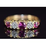 An 18ct gold ring set with rubies and diamonds, 3.4g, size K