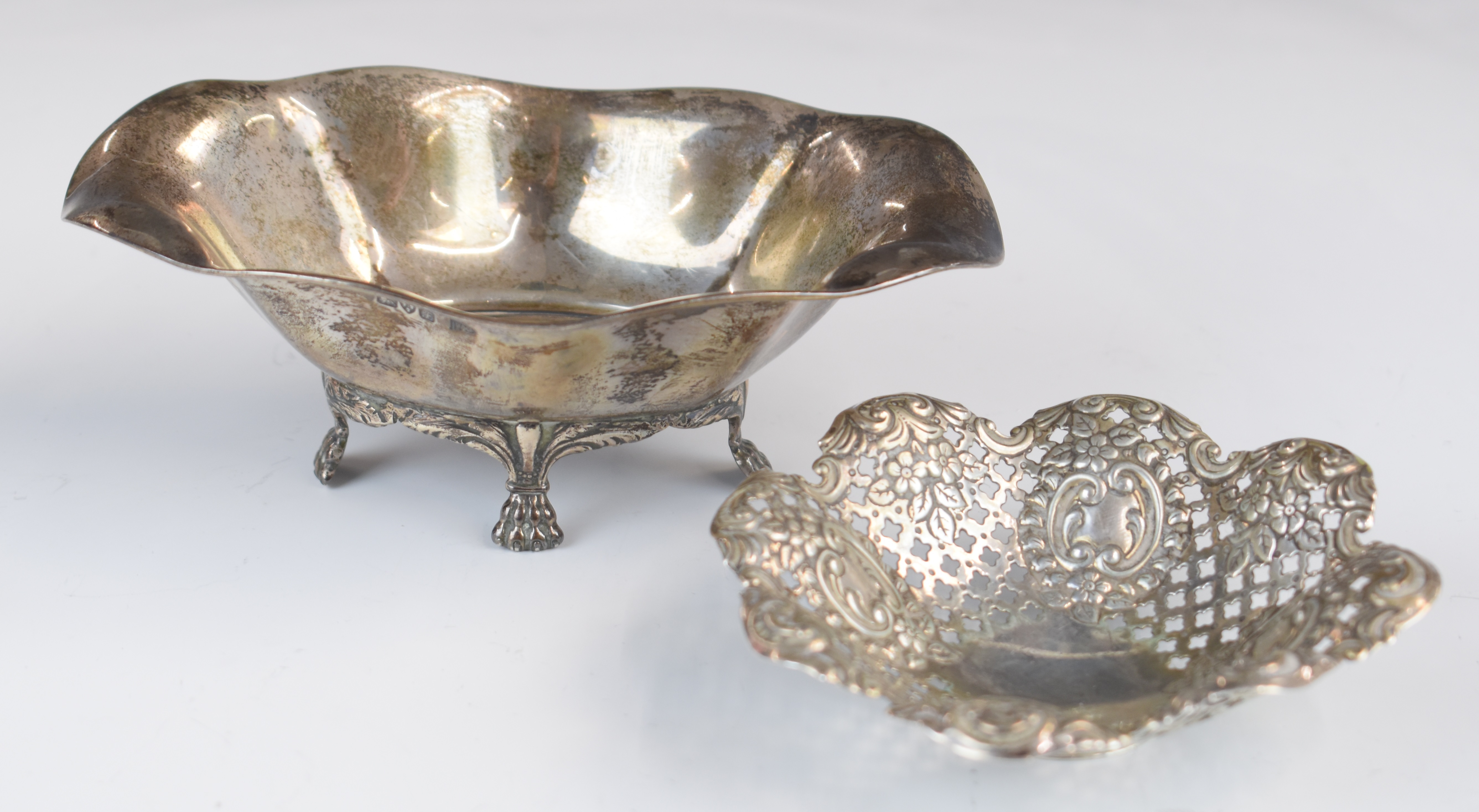 Two hallmarked silver bon bon dishes comprising Victorian pierced and embossed example, Sheffield