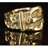 A 9ct gold buckle ring, 9g, size V/W