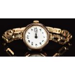 English 9ct gold ladies wristwatch with blued Breguet hands, black Arabic numerals, white dial and