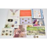 A quantity of Royal Mint etc coin and coin / stamp cover presentation packs etc