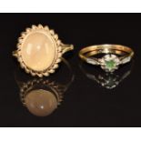 An 18ct gold ring set with an emerald and rose cut diamonds in platinum setting (1.8g, size M) and a