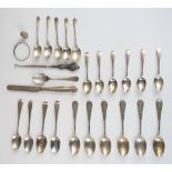 Hallmarked silver teaspoons comprising two sets of six, set of five golfing interest examples and
