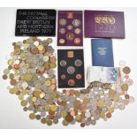 A quantity of overseas coinage together with some UK Royal Mint coin packs, Asian white metal coin