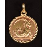 An 18ct gold zodiac pendant, 2.8g, 1.7cm