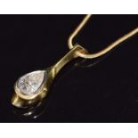An 18ct gold bespoke pendant set with a 1.5ct pear cut diamond, on an 18ct gold chain, 9.1g