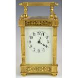 19th or early 20thC gilt cased carriage clock, height including handle 15cm