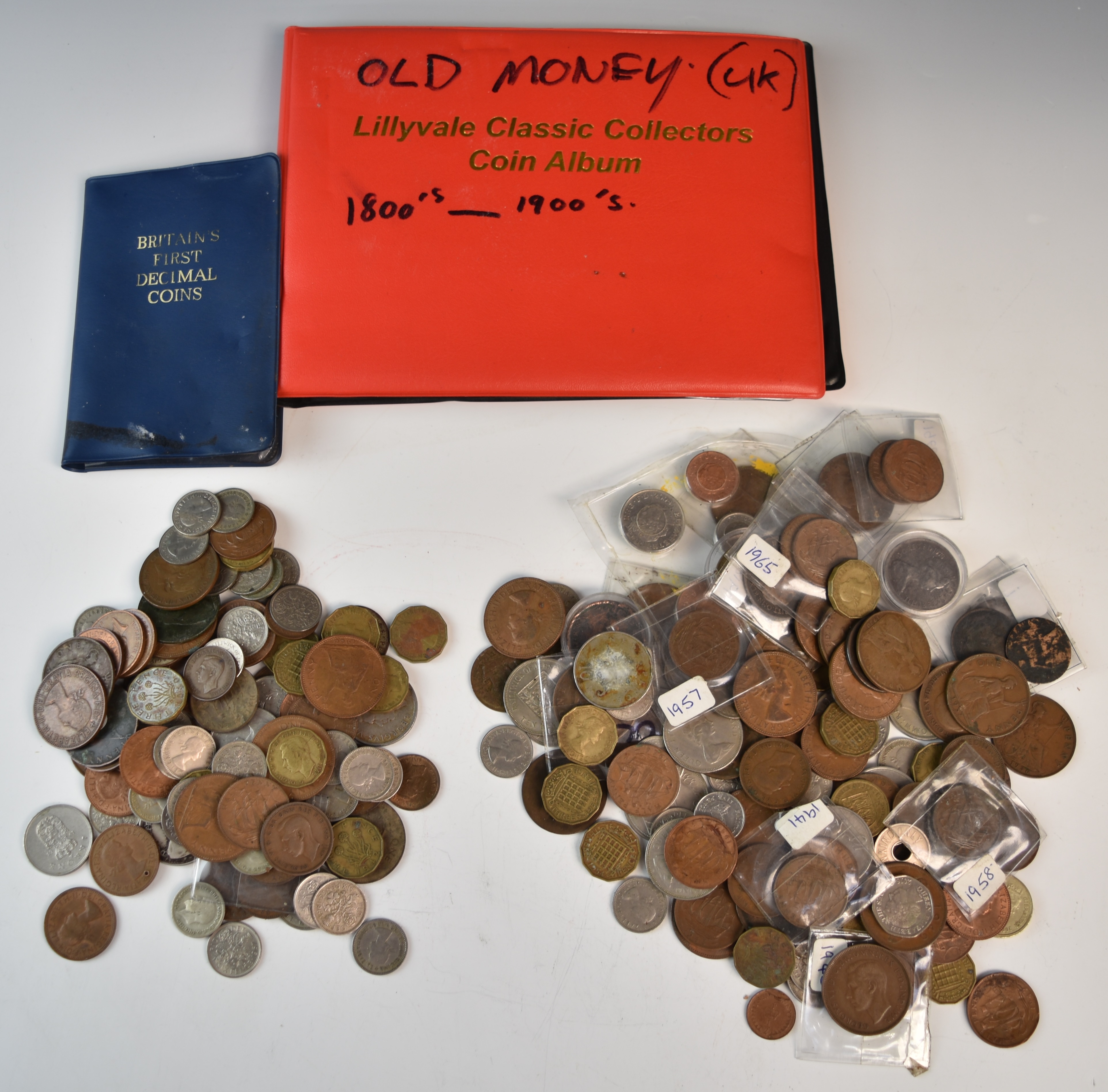 A collection of UK coinage, George III onwards, some in an album