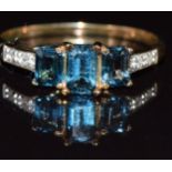 A 9ct gold ring set with topaz and diamonds, 1.4g, size K
