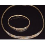 A 9ct gold tri-coloured necklace and bracelet, 24.7g