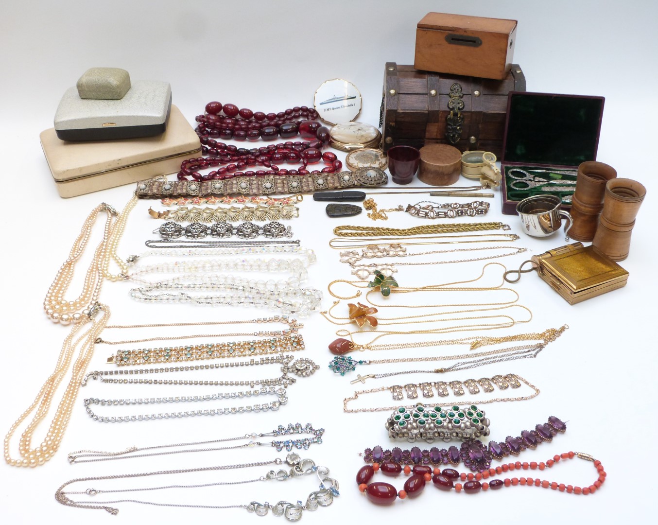 A collection of jewellery and silver including Egyptian glass pendant, coins, white metal sewing set