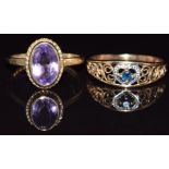 Two 9ct gold rings, one set with an amethyst the other with a sapphire, 3.3g, size J and N