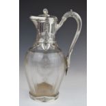 French late 19th or early 20thC silver mounted claret or similar jug with decoration of swans and