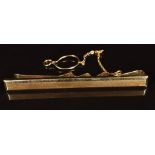 A 14k gold tie clip, 9.8g