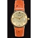 Accurist 9ct gold gentleman's wristwatch with date aperture, gold hands, hour markers and dial and