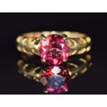 A 14k gold ring set with red topaz, 3.6g, size N