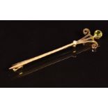 Edwardian 9ct gold brooch set with a peridot and seed pearl, 2.4g