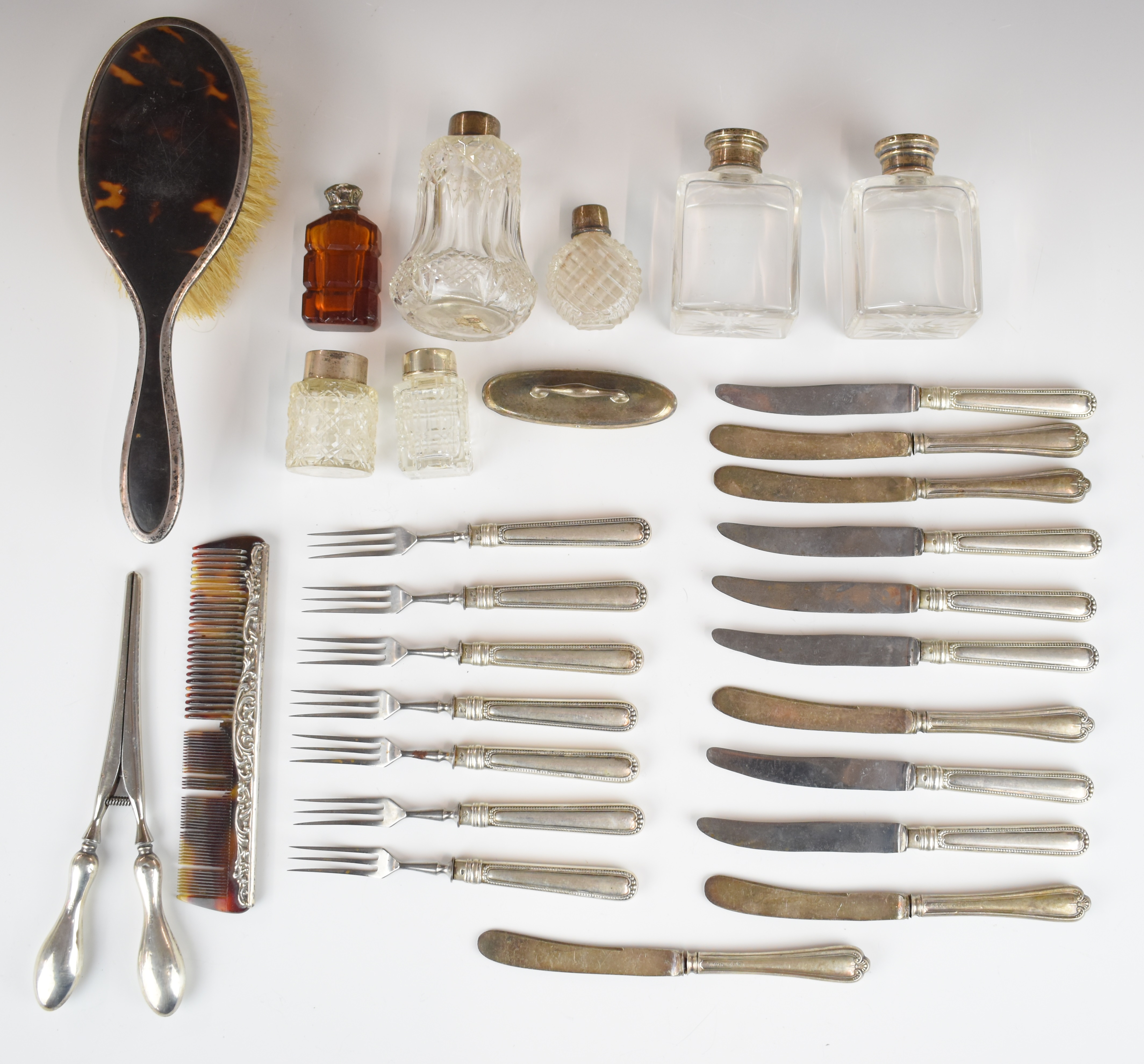 Hallmarked silver mounted and handled items including knives, brush, comb, dressing table bottles