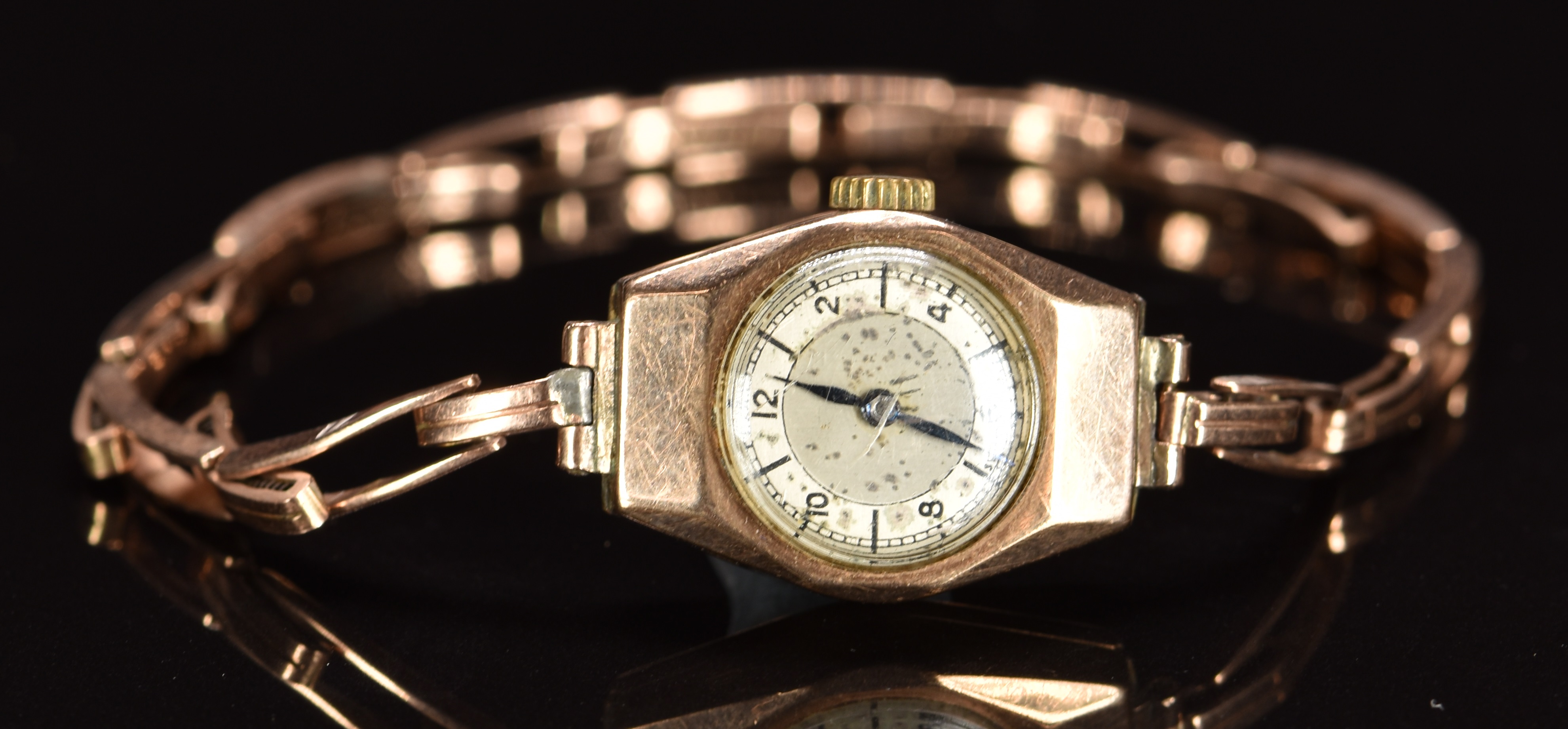 Buren Rival 9ct gold ladies wristwatch with blued hands, Arabic numerals, silver dial and signed