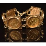 A 9ct gold bracelet set with six gold half sovereigns comprising 1910, two 1916 and 1906, all with