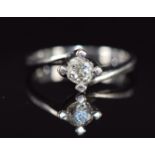 An 18ct white gold ring set with an old mine cut diamond of approximately 0.35ct, 3.4g, size M