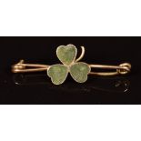 A c1920 9ct gold brooch in the form of a shamrock set with Irish marble, 1.9g, 3cm