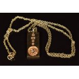 A 9ct gold ingot with embossed St Christopher, on 9ct gold chain, 10.5g