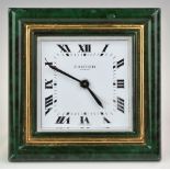 Cartier Paris travel alarm clock with malachite style frame, on gilt easel back, the adjustment