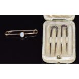 A pair of French c1890 18ct gold hair pins / slides, one set with rose cut diamonds the other with