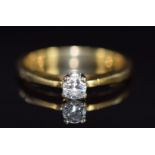An 18ct gold ring set with a round cut diamond of approximately 0.2ct, 4.0g, size N