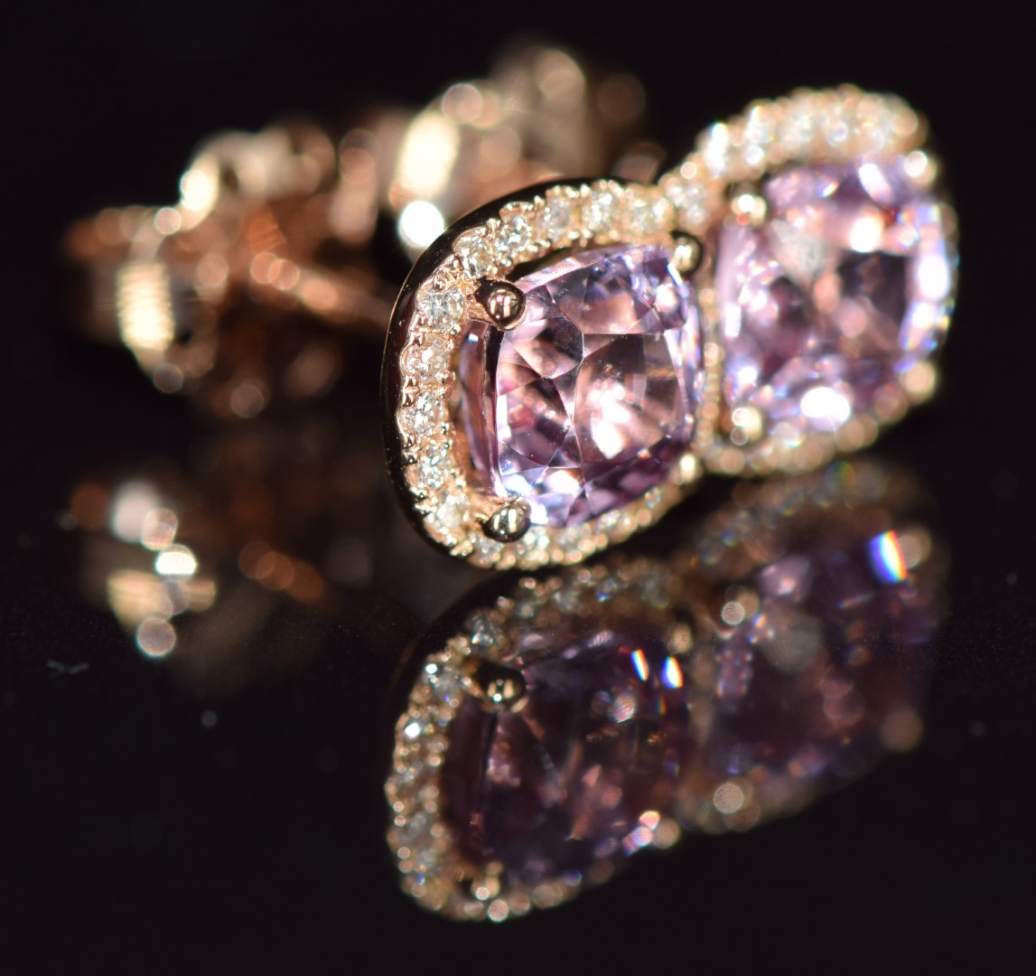 A pair of 18ct rose gold earrings each set with a 1.2ct pink sapphire surrounded by diamonds, 2.5g - Image 2 of 3