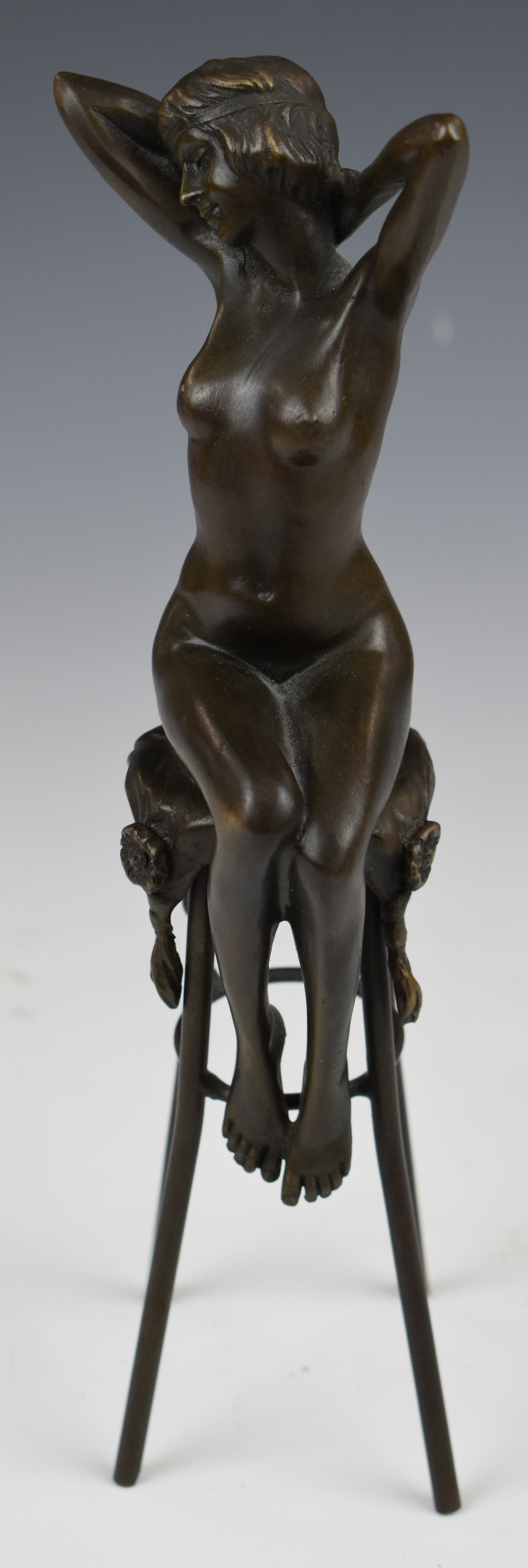 Bronze study of a nude lady on a high stool, height 25cm