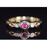 Clougau 9ct gold ring set with a ruby and diamonds, 3.3g, size P