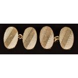 A pair of 9ct gold oval cufflinks with engine turned decoration, 5.2g