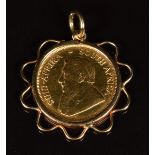 A 9ct gold pendant set with a 1985 1/10 gold Krugerrand, 4.1g