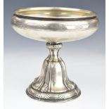 Continental silver pedestal dish with embossed decoration, marked to base 750, diameter 17 x