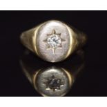 A 9ct gold ring set with a diamond of approximately 0.28ct in a star setting, 6.9g, size Q